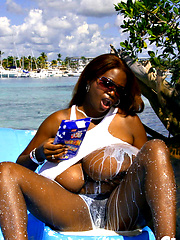 Outdoor milk covered big black tits